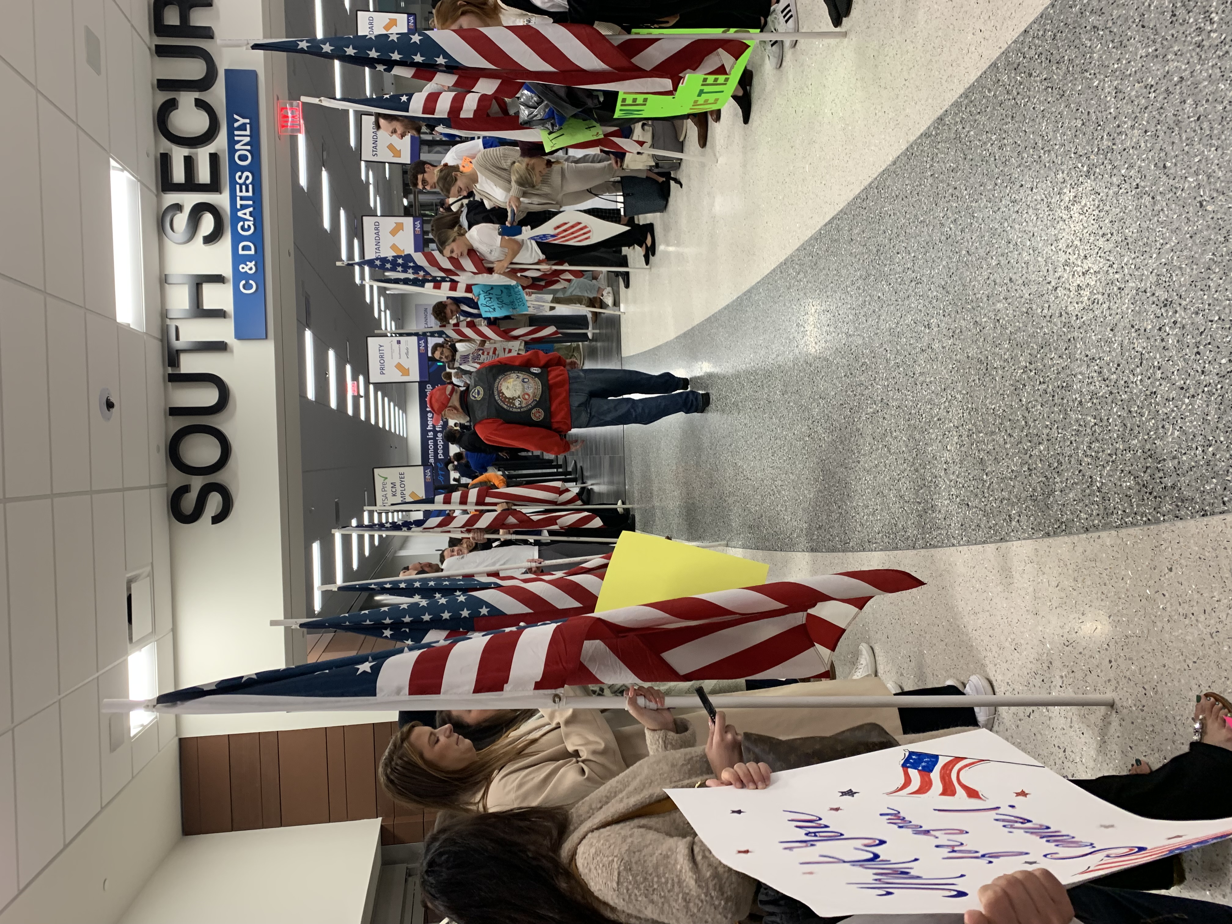 Honor Flight Veteran and crowd